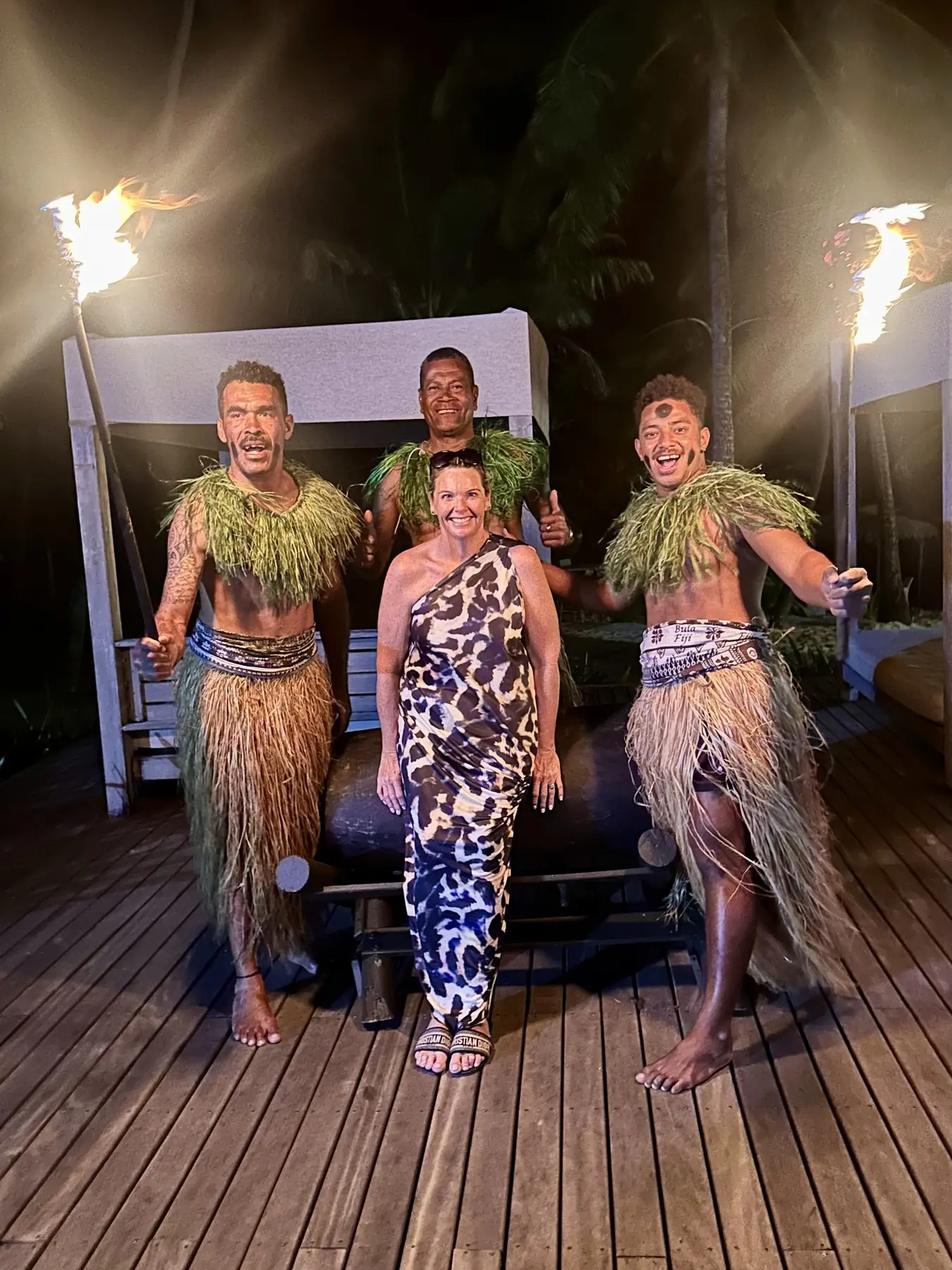 Fijian warriors performing a traditional welcome for arriving guests