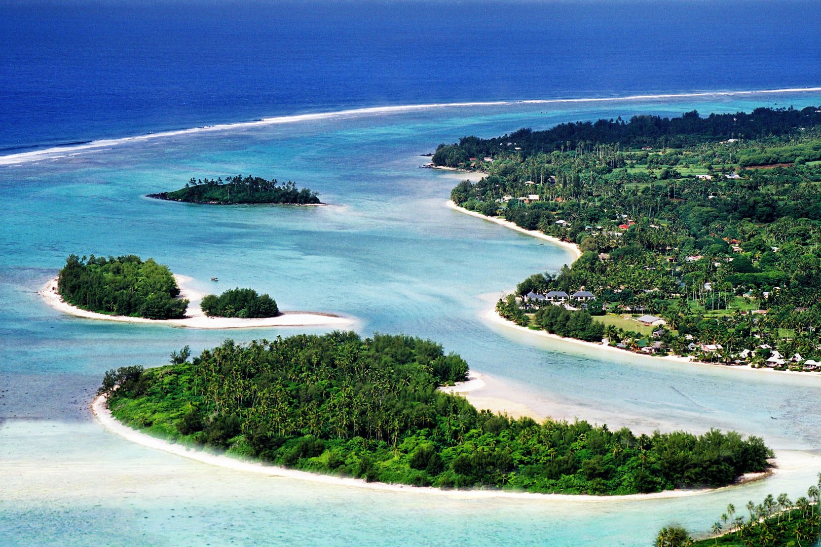 Aerial view of Muri lagoon, Rarotonga, and its motus ringed by turquoise water