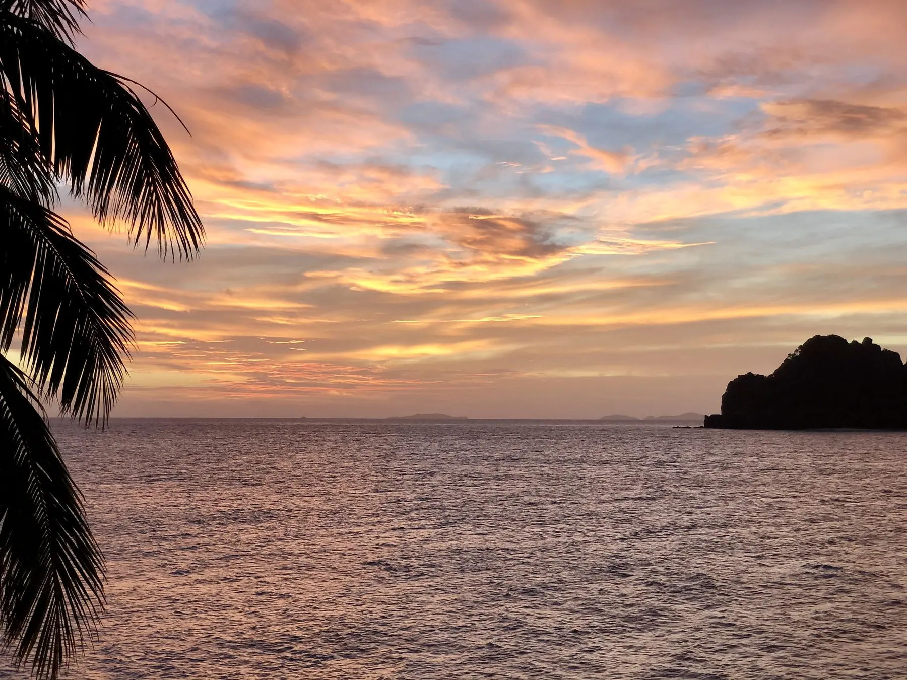 Sunset over the ocean from Vomo Island, Fiji