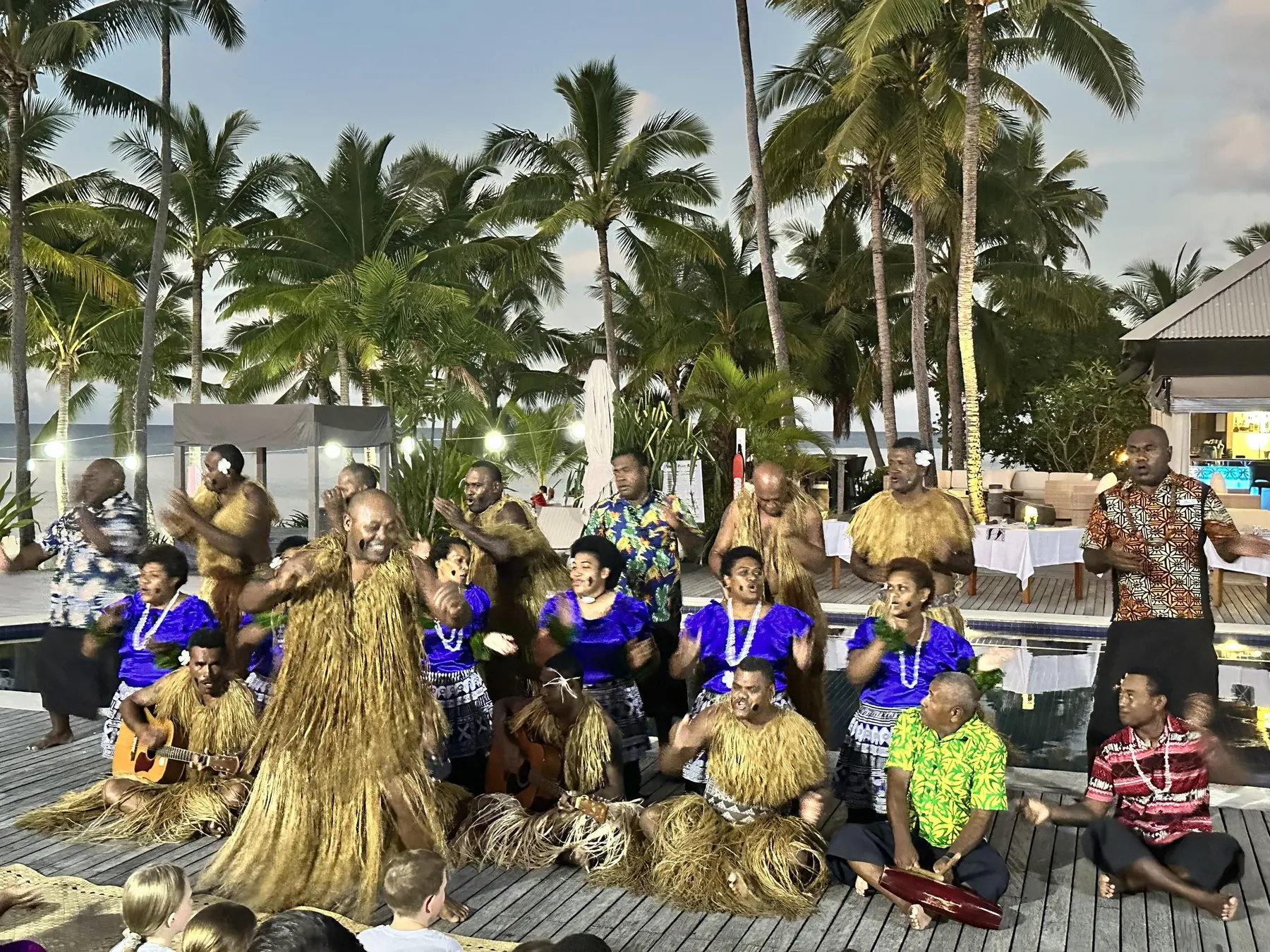 A traditional Fijian meke performance at an island resort